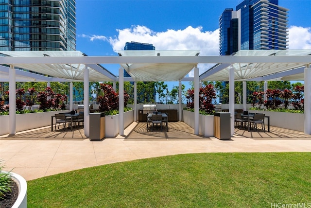 view of patio featuring a pergola and outdoor dining area