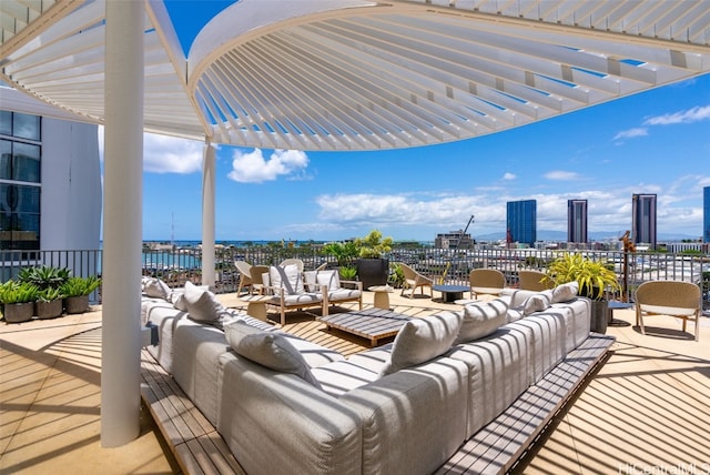 view of patio / terrace with a view of city, outdoor lounge area, and a pergola