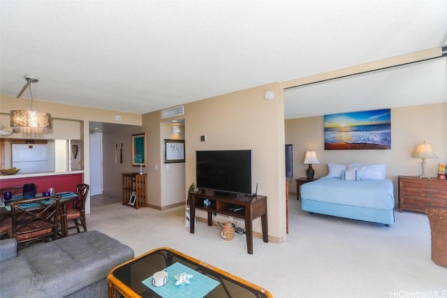 carpeted living room with visible vents