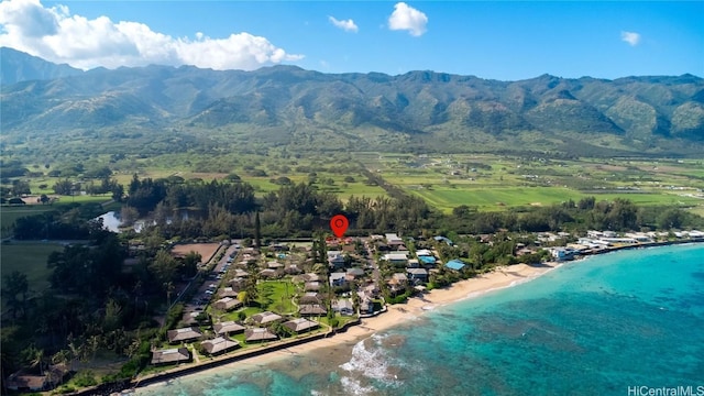 bird's eye view featuring a beach view and a water and mountain view