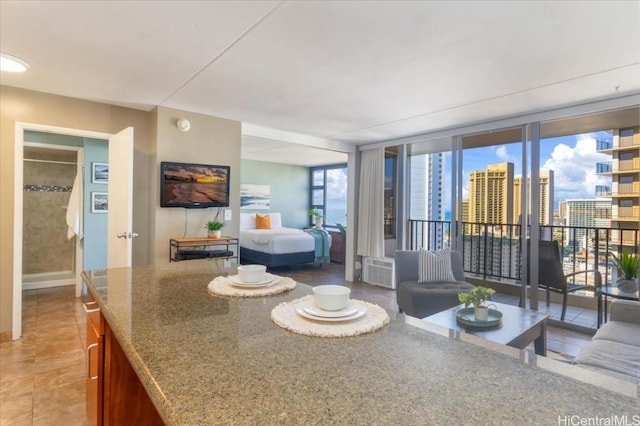 living room with light tile patterned floors