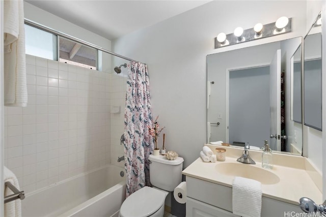 full bath featuring vanity, toilet, and shower / bath combo with shower curtain