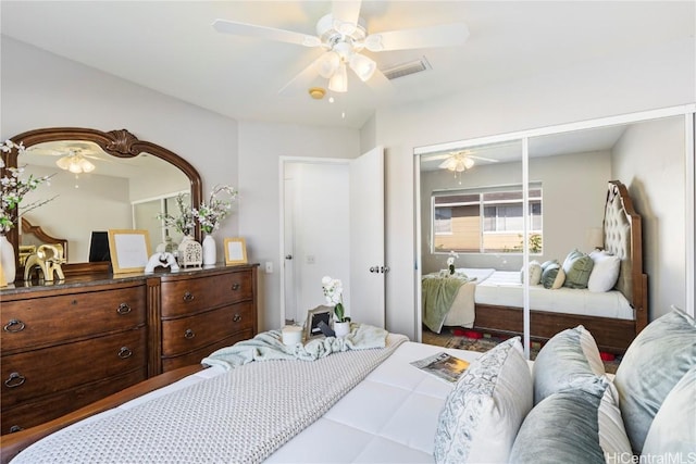 bedroom with a ceiling fan, a closet, and visible vents