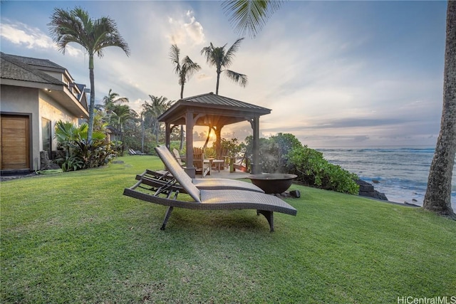 view of yard with a water view and a gazebo