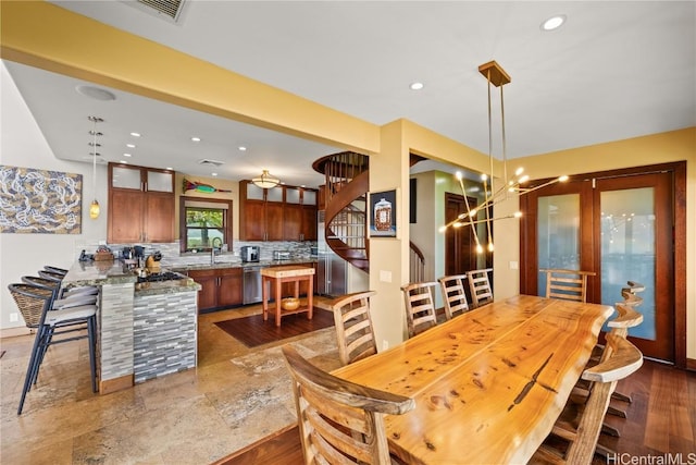 dining room with visible vents, stairway, a chandelier, and recessed lighting