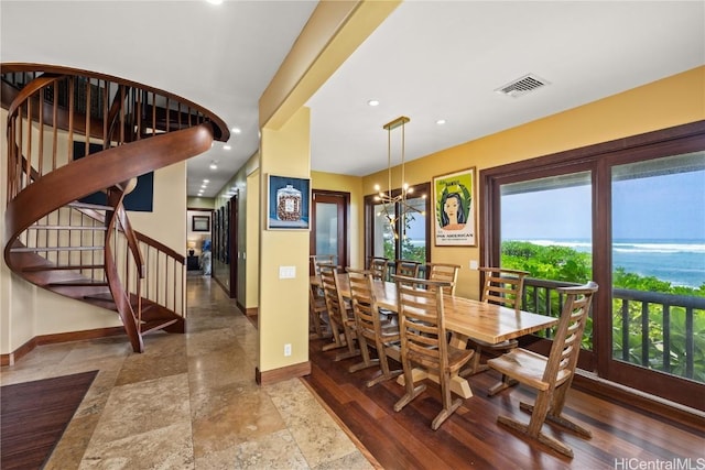 dining room with baseboards, visible vents, an inviting chandelier, stairs, and recessed lighting