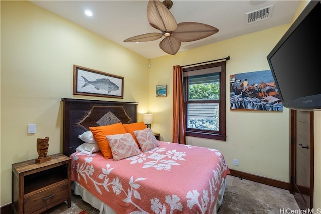 bedroom with a ceiling fan, visible vents, and baseboards