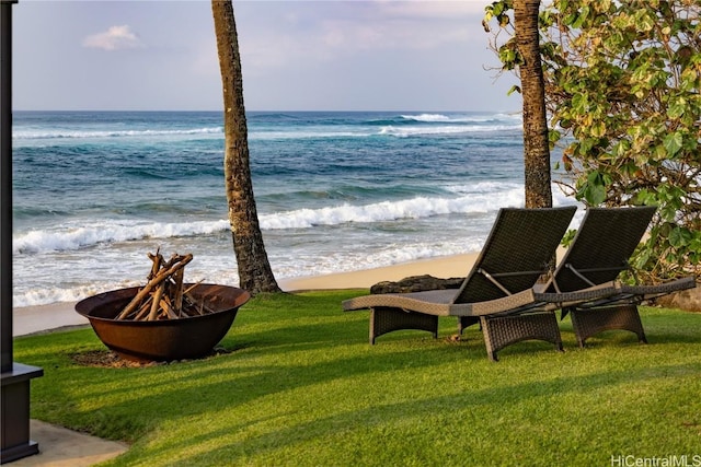 view of water feature with an outdoor fire pit