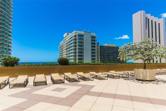 view of patio / terrace featuring a view of city