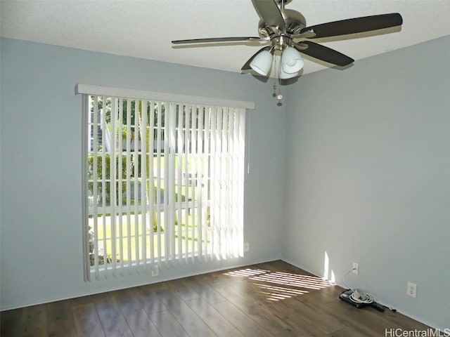 empty room with wood finished floors