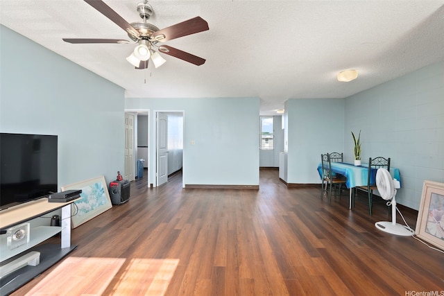 94-246 Leoku St Unit E306, Waipahu, HI 96797 - living room featuring wood finished floors, a ceiling fan, and a textured ceiling