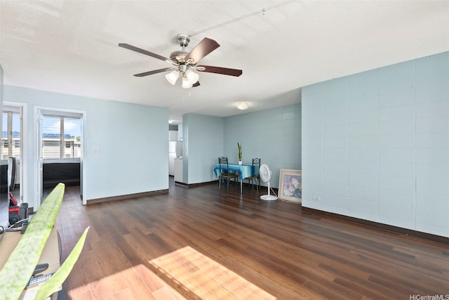 94-246 Leoku St Unit E306, Waipahu, HI 96797 - sitting room with wood finished floors and ceiling fan