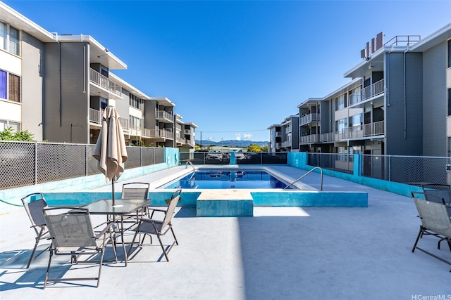 94-246 Leoku St Unit E306, Waipahu, HI 96797 - community pool featuring a patio