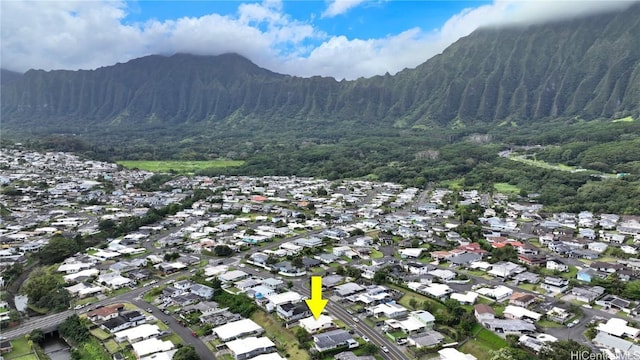 aerial view featuring a mountain view and a view of trees