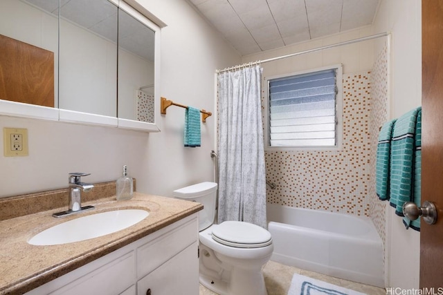 full bathroom featuring shower / bath combo, vanity, and toilet