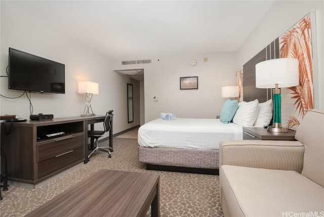 bedroom featuring carpet and visible vents