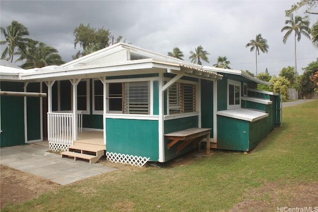 view of property exterior featuring a yard