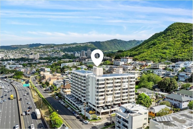 bird's eye view with a city view and a mountain view