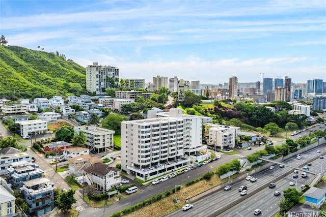 birds eye view of property with a view of city