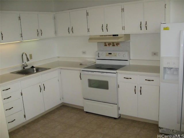 kitchen featuring white appliances, light countertops, under cabinet range hood, white cabinetry, and a sink