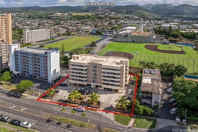 drone / aerial view featuring a mountain view
