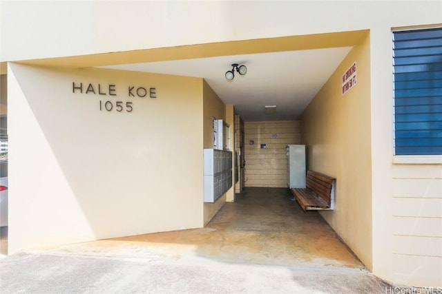 corridor featuring concrete flooring