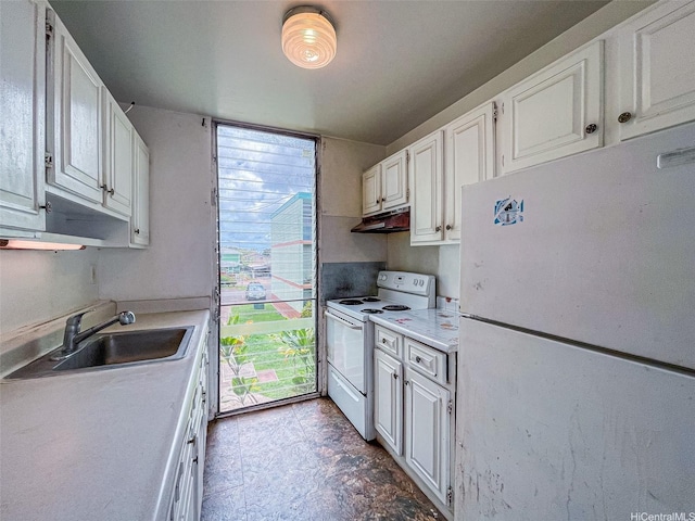 1016 Ehoeho Ave Unit 208, Wahiawa, HI 96786 - kitchen with white appliances, a sink, under cabinet range hood, white cabinetry, and light countertops