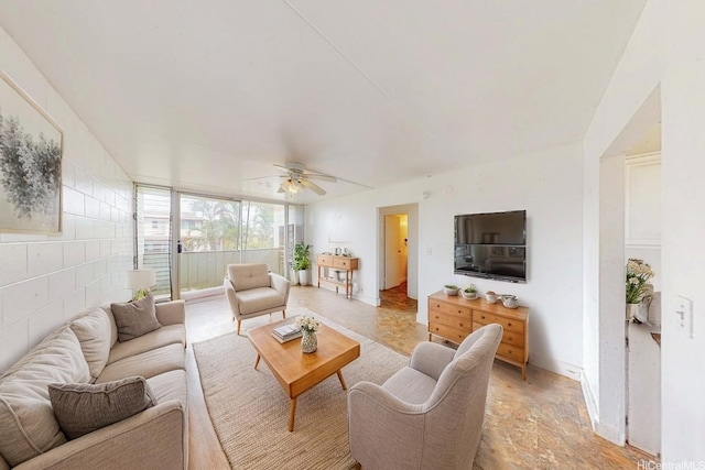 1016 Ehoeho Ave Unit 208, Wahiawa, HI 96786 - living room featuring ceiling fan and baseboards