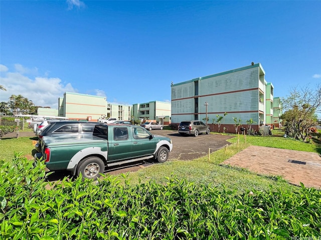 1016 Ehoeho Ave Unit 208, Wahiawa, HI 96786 - view of uncovered parking lot
