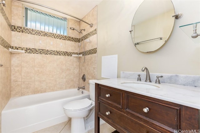 full bath featuring shower / bathtub combination, tile patterned flooring, vanity, and toilet