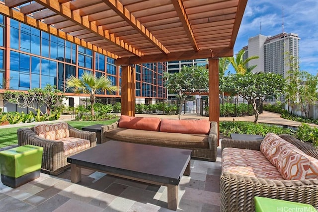 view of patio / terrace featuring outdoor lounge area, a pergola, and fence