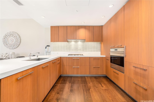 1555 Kapiolani Blvd Unit 1900, Honolulu, HI 96814 - kitchen with stainless steel appliances, a sink, light countertops, modern cabinets, and recessed lighting