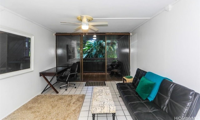 office area featuring crown molding, ceiling fan, and tile patterned floors