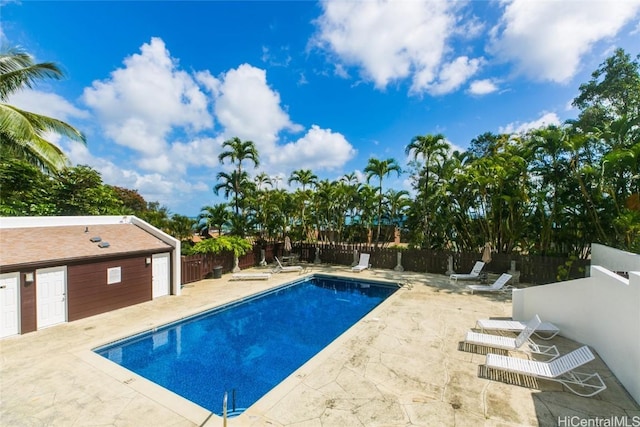 view of swimming pool with a fenced in pool, a patio area, and a fenced backyard