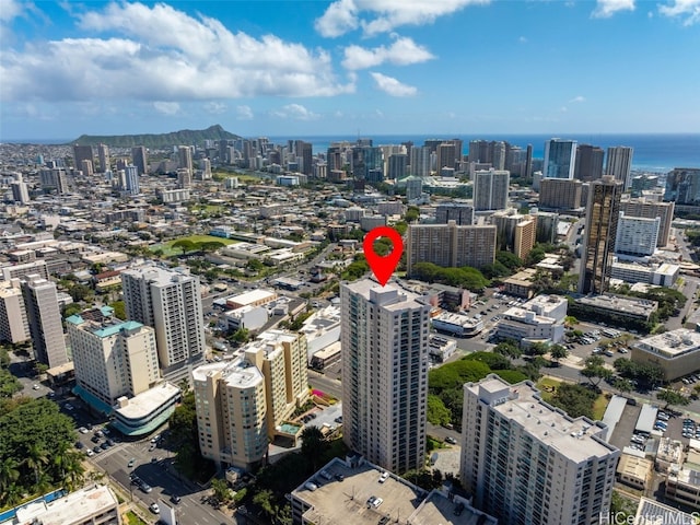 birds eye view of property featuring a view of city and a water view