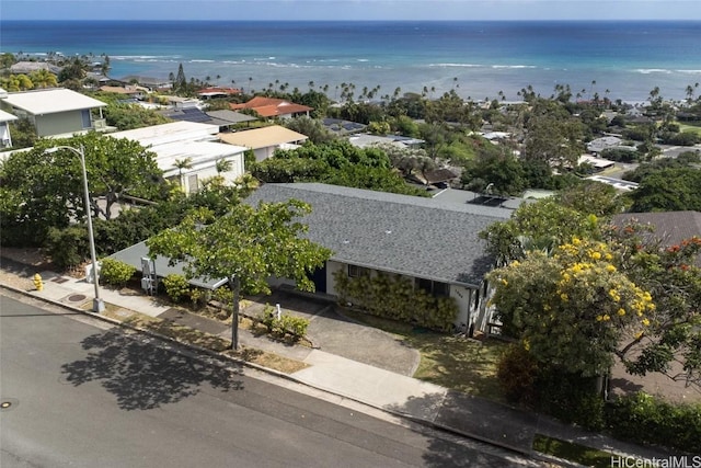 bird's eye view featuring a water view and a view of the beach