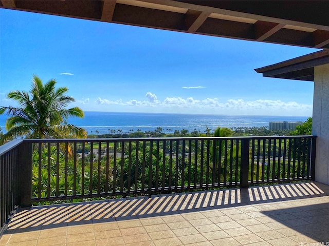 balcony featuring a water view