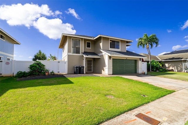 view of front of house with fence, driveway, an attached garage, stucco siding, and a front lawn