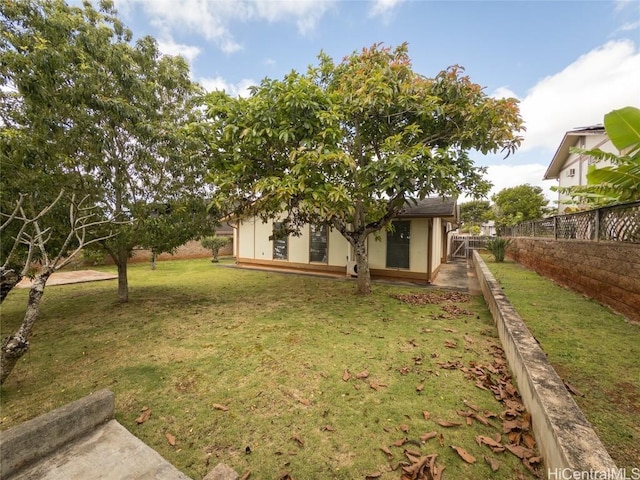 view of yard with fence