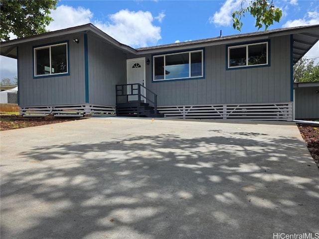 view of front of property with concrete driveway