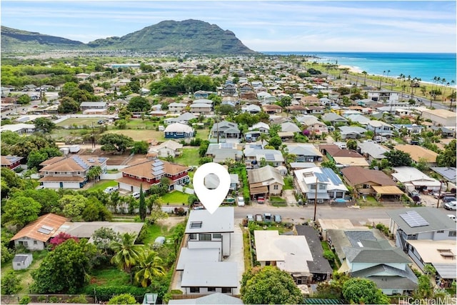 bird's eye view featuring a residential view and a water and mountain view