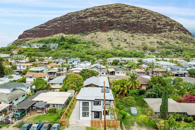 exterior space with a residential view and a mountain view