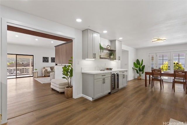 kitchen with beverage cooler, open shelves, french doors, and a wealth of natural light