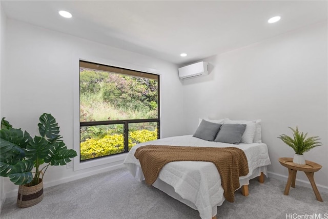 bedroom with recessed lighting, an AC wall unit, light carpet, and baseboards