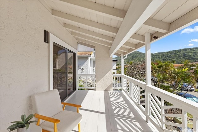 balcony featuring a mountain view