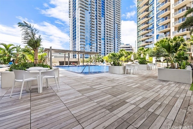 community pool featuring a view of city