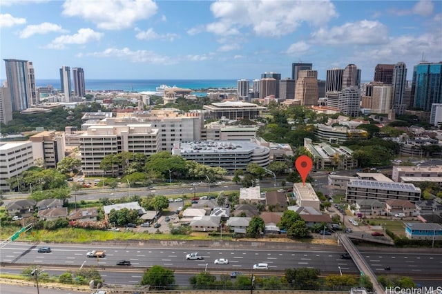 drone / aerial view with a water view and a view of city