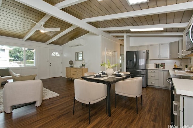 dining area featuring dark wood finished floors, a ceiling fan, lofted ceiling with skylight, wood ceiling, and an AC wall unit