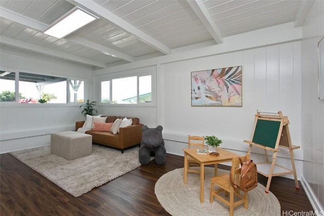 living area featuring wooden ceiling, dark wood finished floors, and beam ceiling