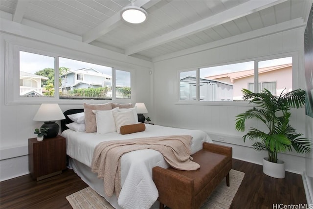 bedroom with dark wood-style flooring, wooden ceiling, and beam ceiling